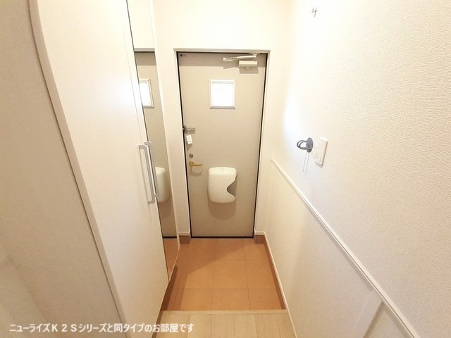 ユニゾン　スクエアの玄関